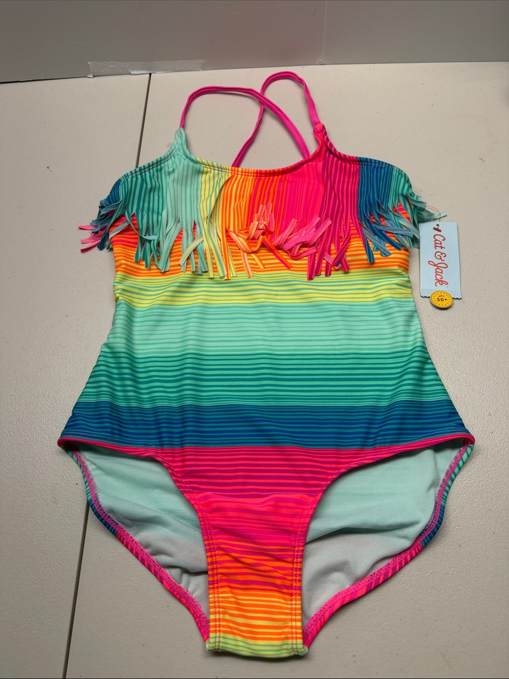 Cat & Jack Bright Rainbow Fringe One-Piece Swimsuit - Pink, Teal, Yellow, Blue.